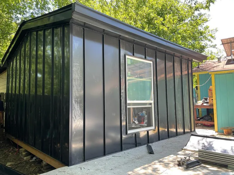 Black standing seam metal wall panels for Metal Roof Installation in Blytheville